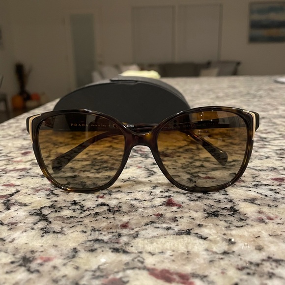 Prada sunglasses. Worn only a few times. Great condition. main image 5